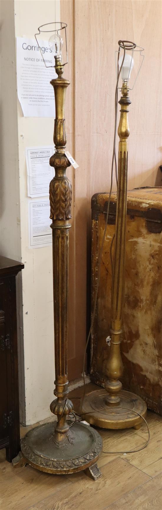 Two carved giltwood lamp standards H.173cm and 170cm approx.